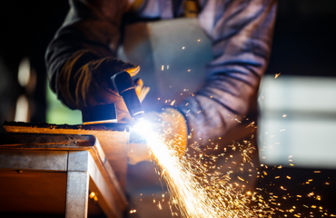 Welder Cutting Metal