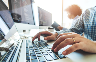 Person Typing On Computer