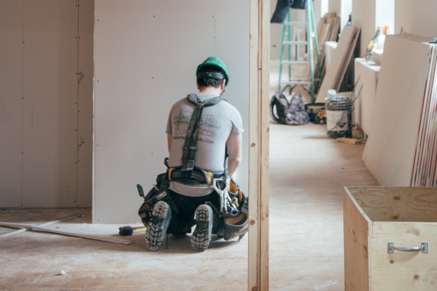 Construction Worker Kneeling Down