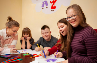 SEND Students Painting In A Group