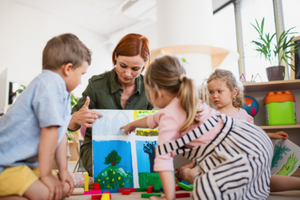 Childcare Worker With Young Children