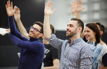 Students With Hands Raised